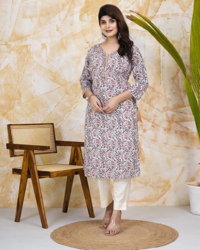 Stylish Indian woman wearing a designer embroidered kurti showcasing the latest women's fashion trends for 2026.