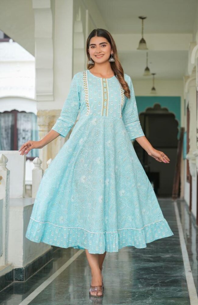 Stylish Indian woman wearing a designer embroidered kurti showcasing the latest women's fashion trends for 2026.